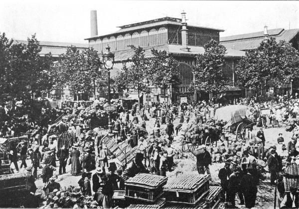 THE HALLES CENTRALES, PARIS

An Outside View, Showing How the Supplies Overflow into the Adjacent Streets, Notwithstanding the
Provision of Twenty-two Acres of Covered Pavilions.